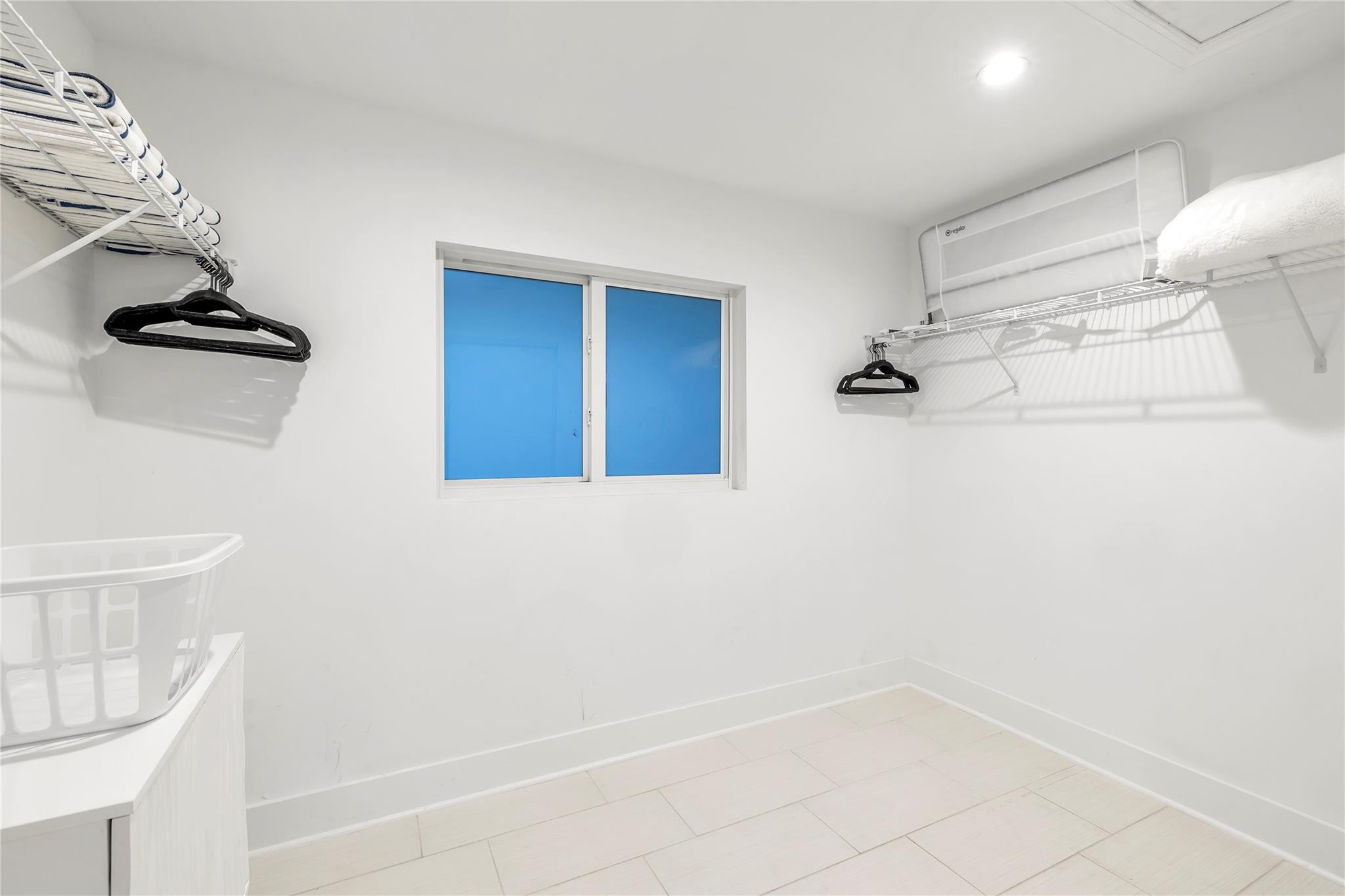 2120 Northeast 34th Court Lighthouse Point, FL 33064 - Photo 26 of 34 a bathroom with a bathtub and shower