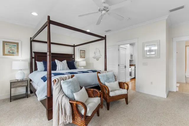 a bedroom with furniture and a window