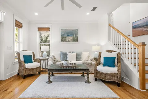 a view of a balcony with wooden floor and fence