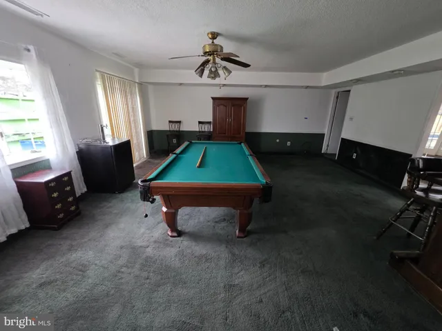 a room with furniture and a chandelier