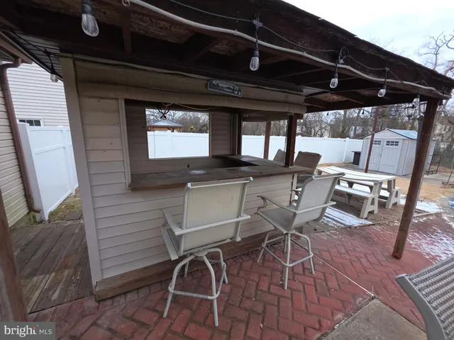 a view of a chairs and table in the patio