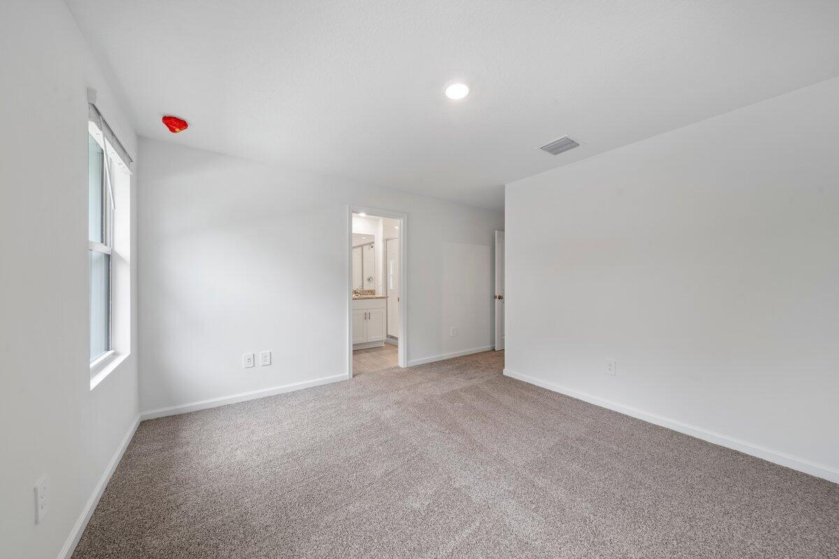 474 Salisbury Circle Fort Pierce, FL 34982 - Photo 13 of 17 a view of an empty room