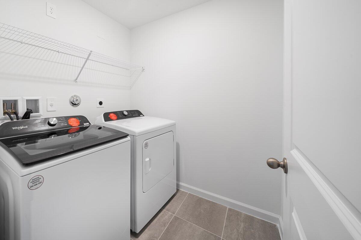 474 Salisbury Circle Fort Pierce, FL 34982 - Photo 16 of 17 a utility room with dryer and washer