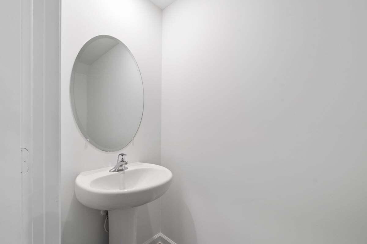 474 Salisbury Circle Fort Pierce, FL 34982 - Photo 4 of 17 a bathroom with a sink and a mirror