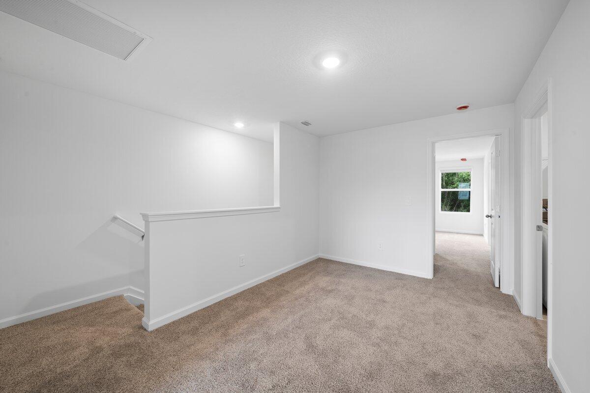 474 Salisbury Circle Fort Pierce, FL 34982 - Photo 7 of 17 an empty room with an entryway