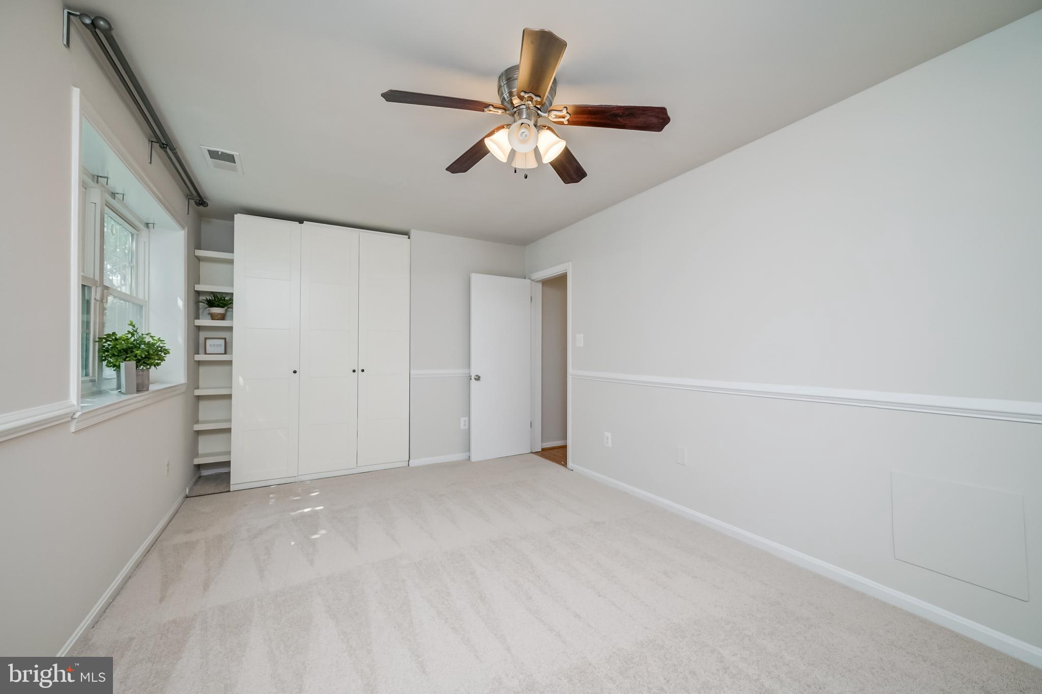 1672 Ridgely Court Crofton, MD 21114 - Photo 24 of 26 Secondary bedroom with ceiling fan & two closets