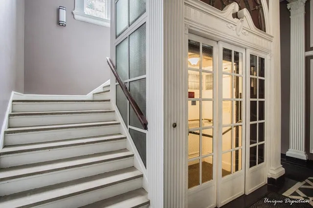 a view of entryway with a front door