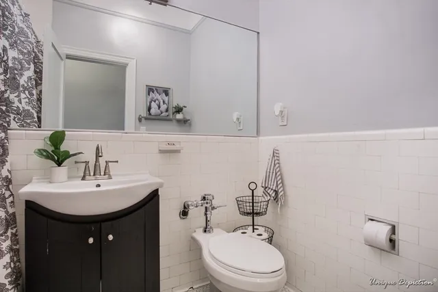 a bathroom with a sink and a toilet