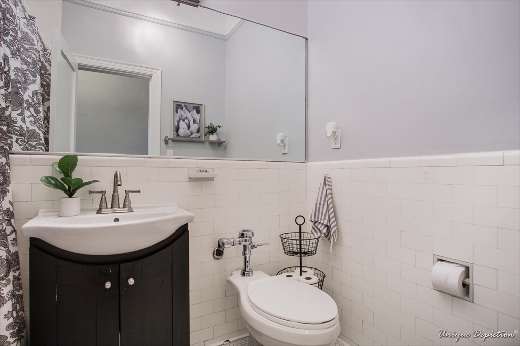 354 North Main Street, Unit 303 Andover, MA 01810 - Photo 9 of 16 a bathroom with a sink and a toilet