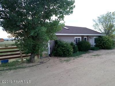 2160 West Storm Road Paulden, AZ 86334 - Photo 1 of 18 a front view of a house with a yard