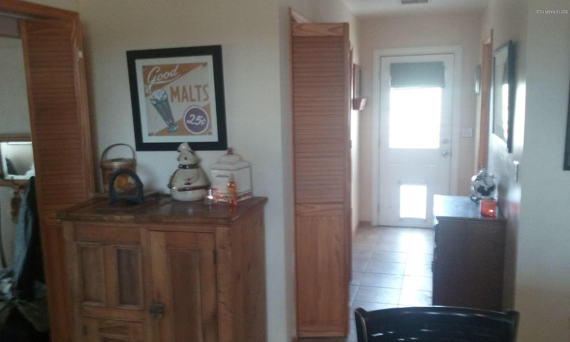 2160 West Storm Road Paulden, AZ 86334 - Photo 12 of 18 a dining room with furniture and wooden floor