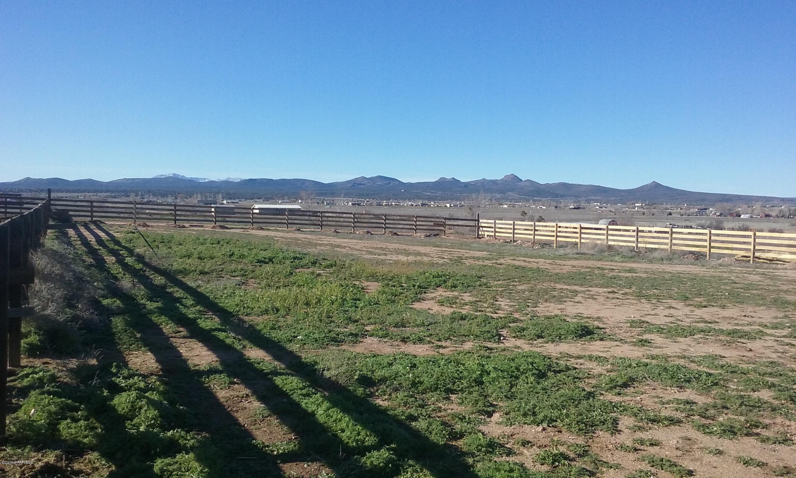 2160 West Storm Road Paulden, AZ 86334 - Photo 17 of 18 a view of an lake with a mountain in the background