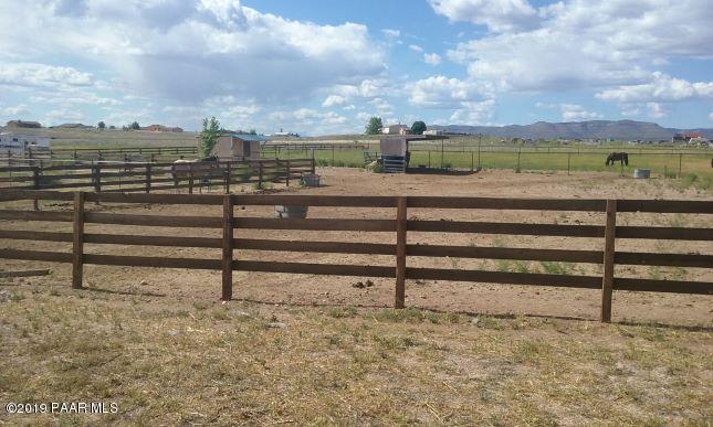 2160 West Storm Road Paulden, AZ 86334 - Photo 18 of 18 a view of a yard with wooden benches