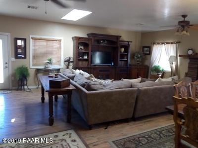 2160 West Storm Road Paulden, AZ 86334 - Photo 5 of 18 a living room with furniture and a flat screen tv