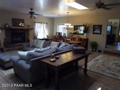 2160 West Storm Road Paulden, AZ 86334 - Photo 6 of 18 a living room with furniture and a fireplace