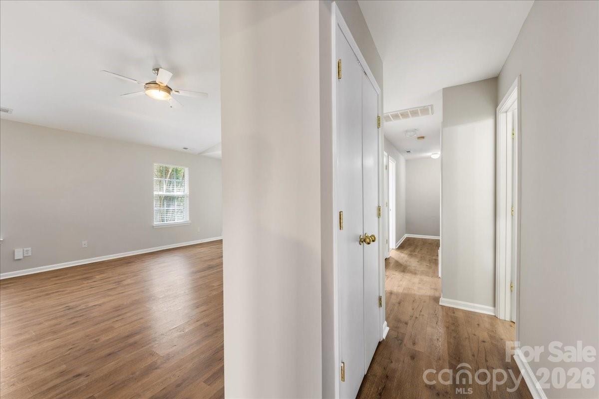 2872 Signal Court Southwest Concord, NC 28025 - Photo 20 of 43 a view of a bedroom from a hallway