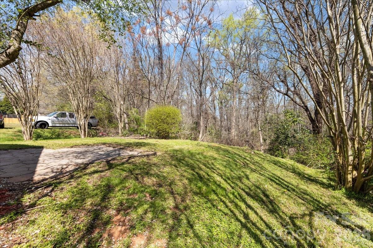 2872 Signal Court Southwest Concord, NC 28025 - Photo 41 of 43 a view of yard with trees