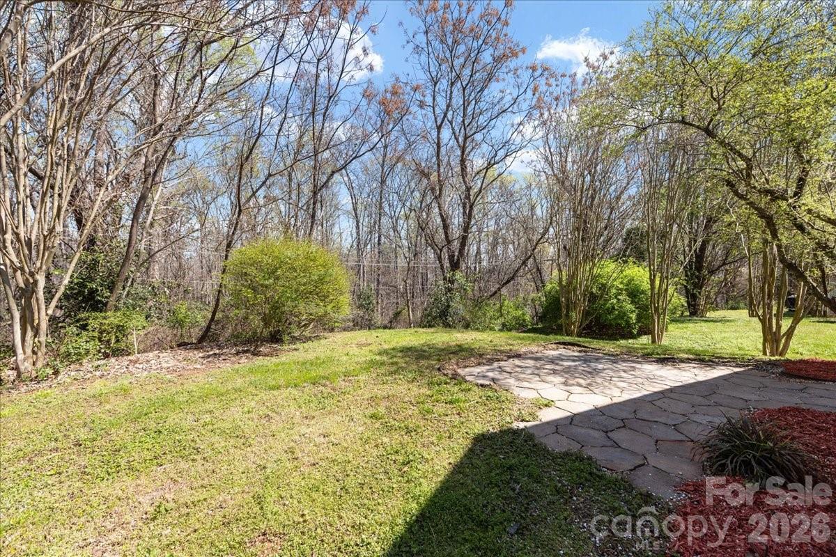 2872 Signal Court Southwest Concord, NC 28025 - Photo 42 of 43 a view of a yard with trees