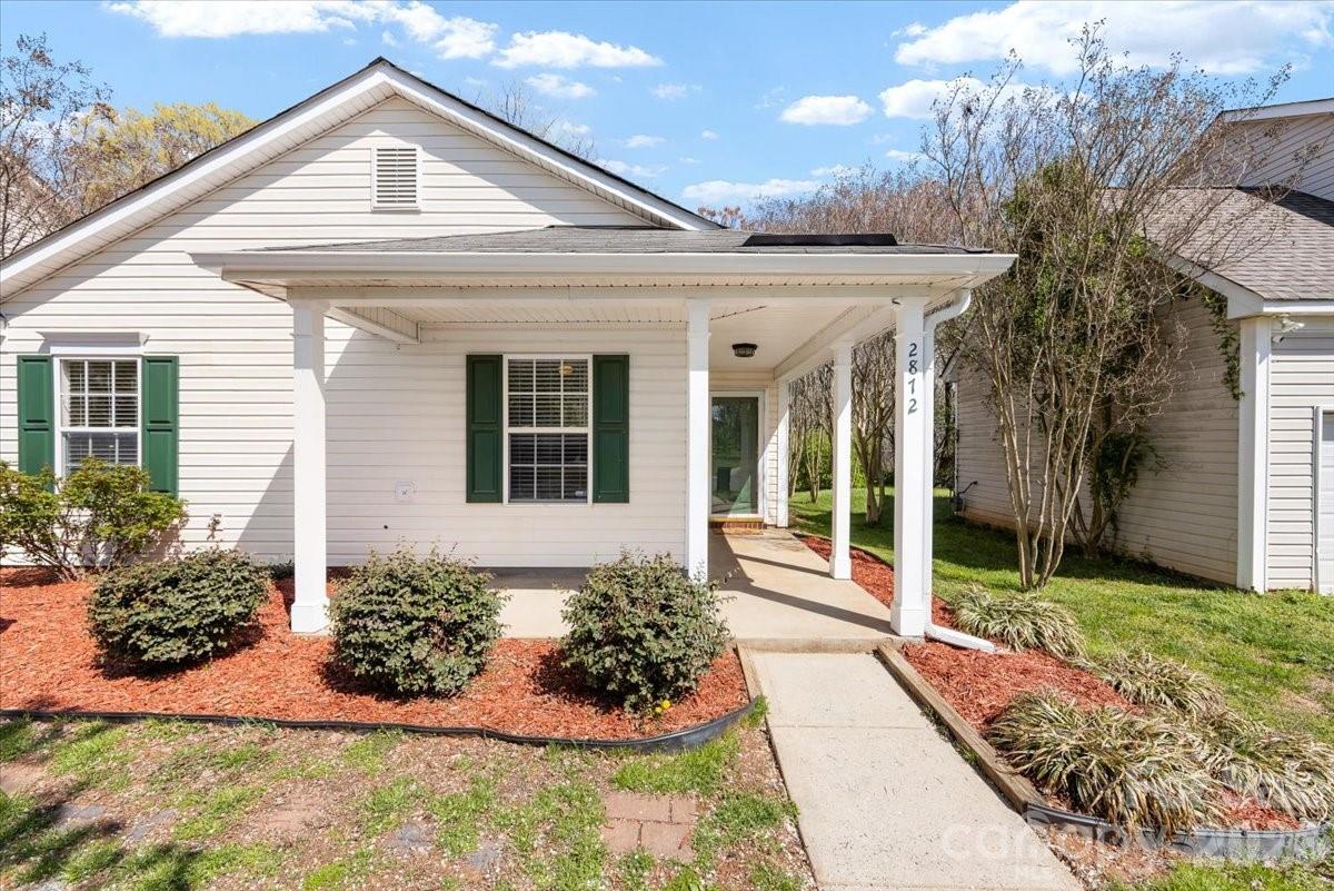 2872 Signal Court Southwest Concord, NC 28025 - Photo 6 of 43 a front view of a house