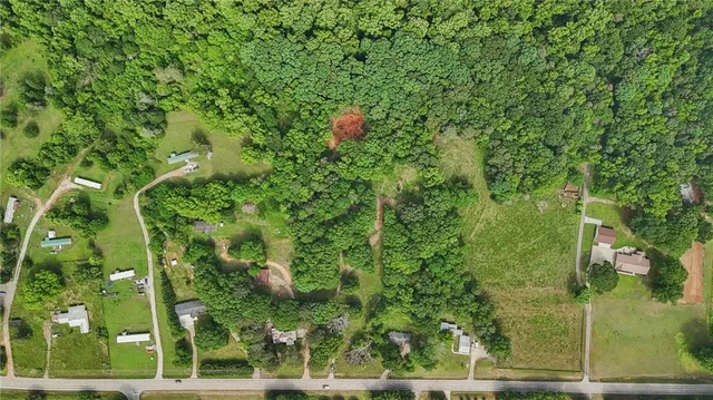 a backyard of a house with lots of green space