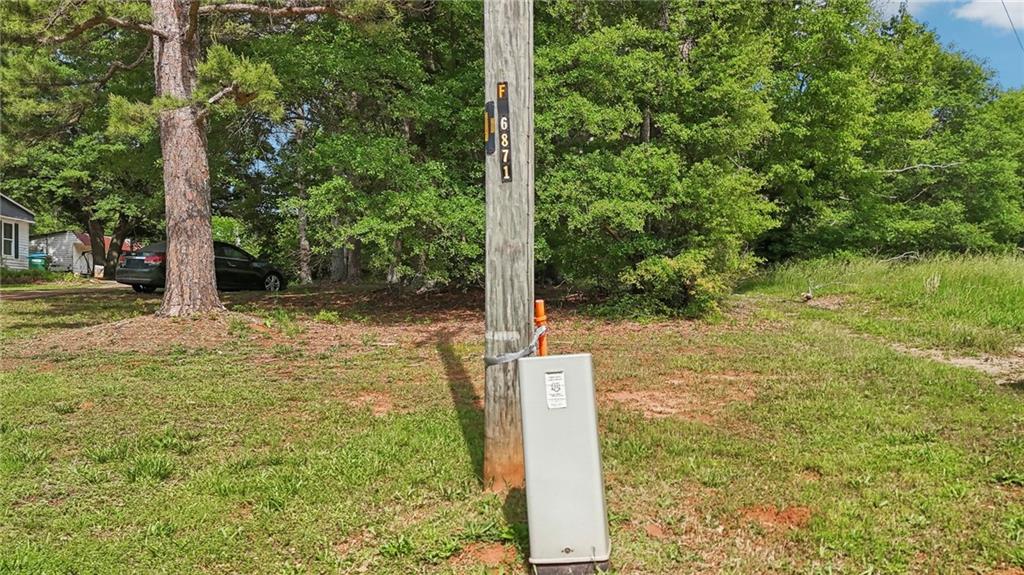 955 Highway 82 Jefferson, GA 30549 - Photo 19 of 28 a view of a back yard with plants