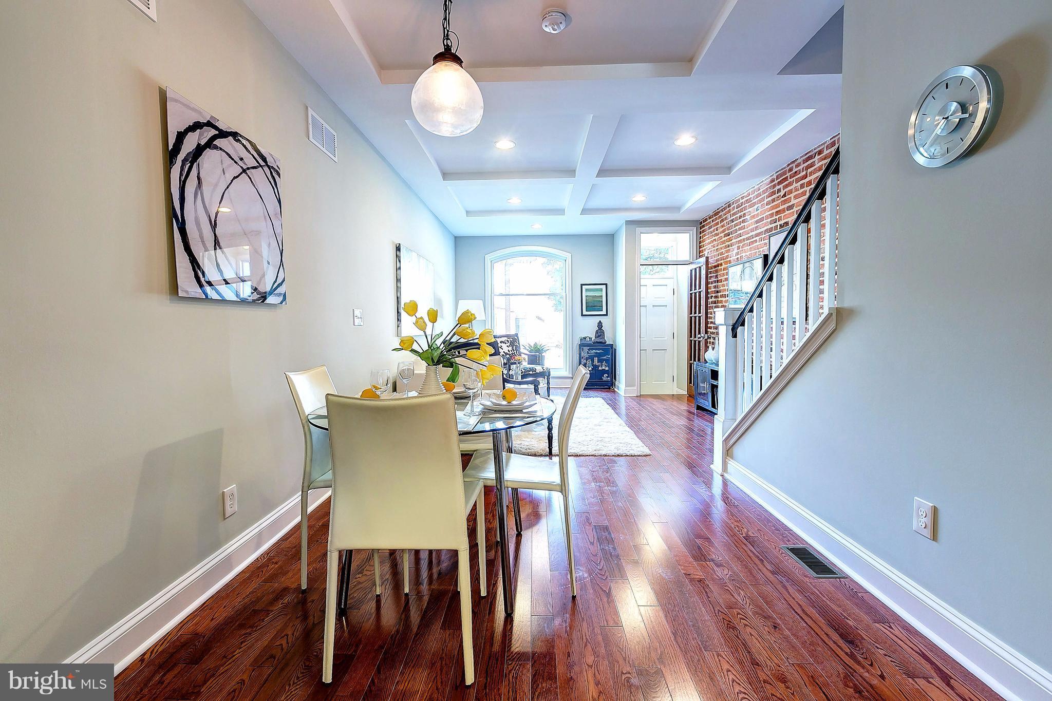 800 South Streeper Street Baltimore, MD 21224 - Photo 4 of 17 a view of a dining room with furniture and wooden floor