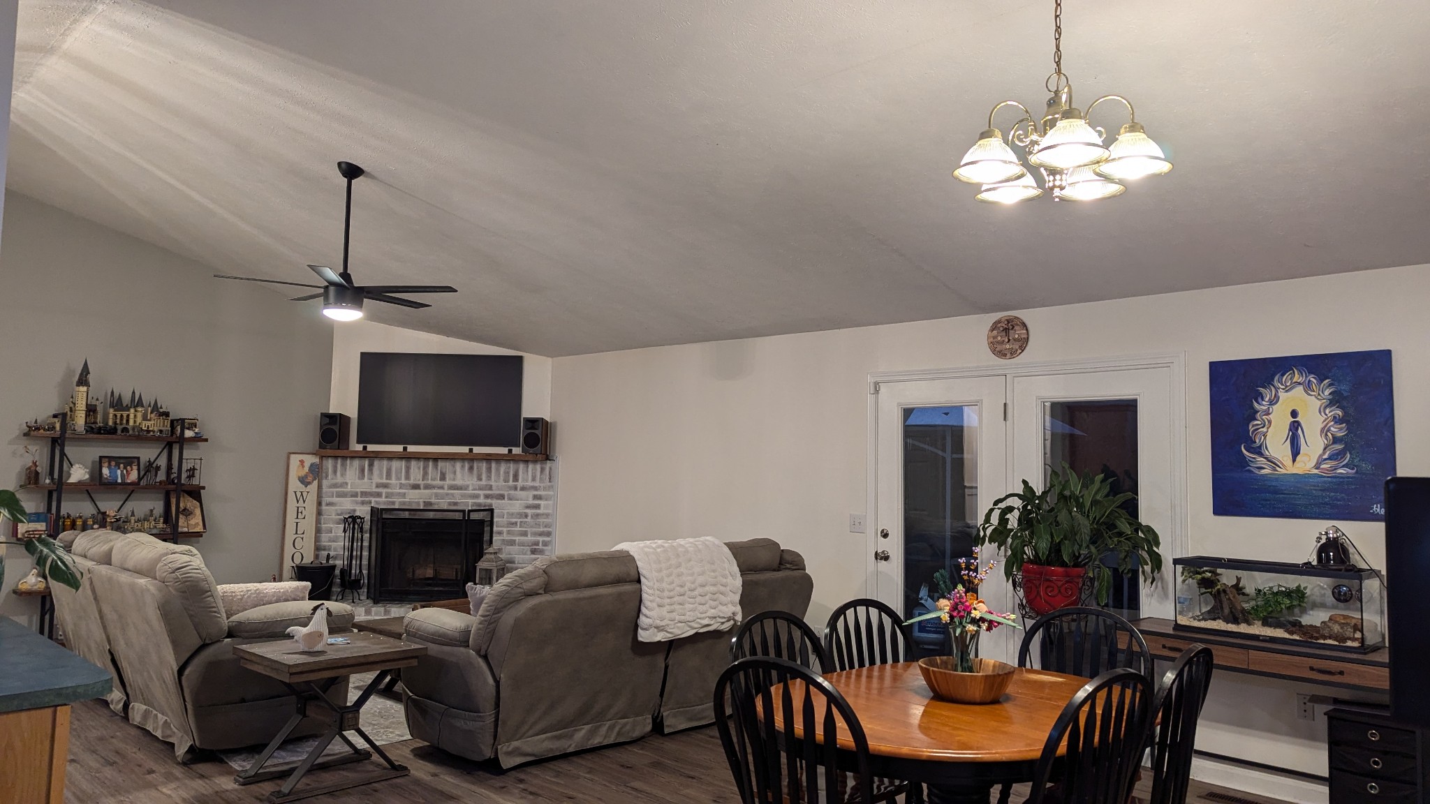 1099 North Boiling Springs Road Portland, TN 37148 - Photo 14 of 39 a living room with furniture a fireplace and a flat screen tv