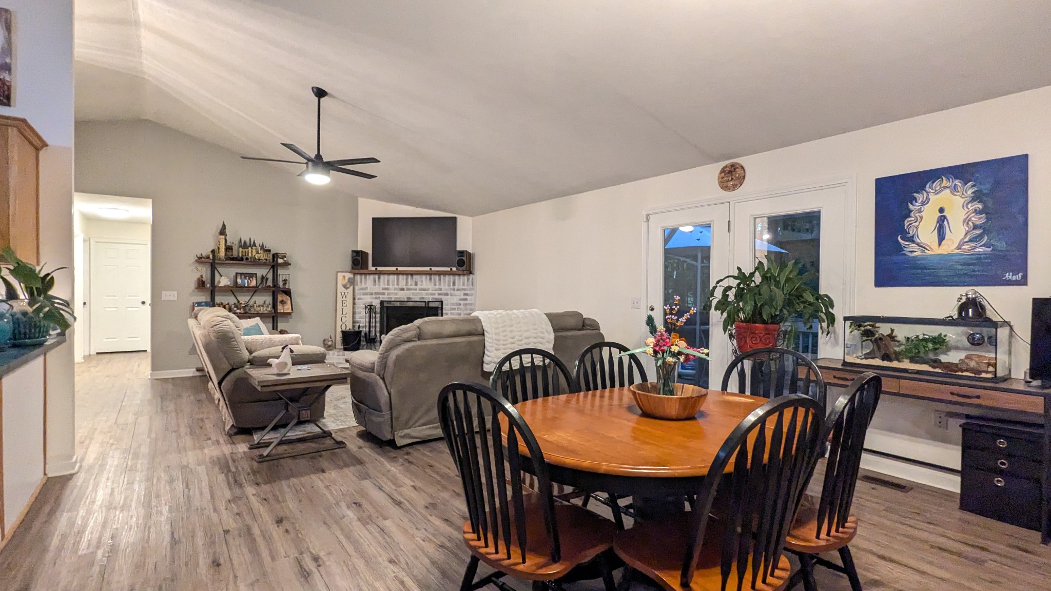1099 North Boiling Springs Road Portland, TN 37148 - Photo 15 of 39 a view of a dining room with furniture wooden floor and chandelier