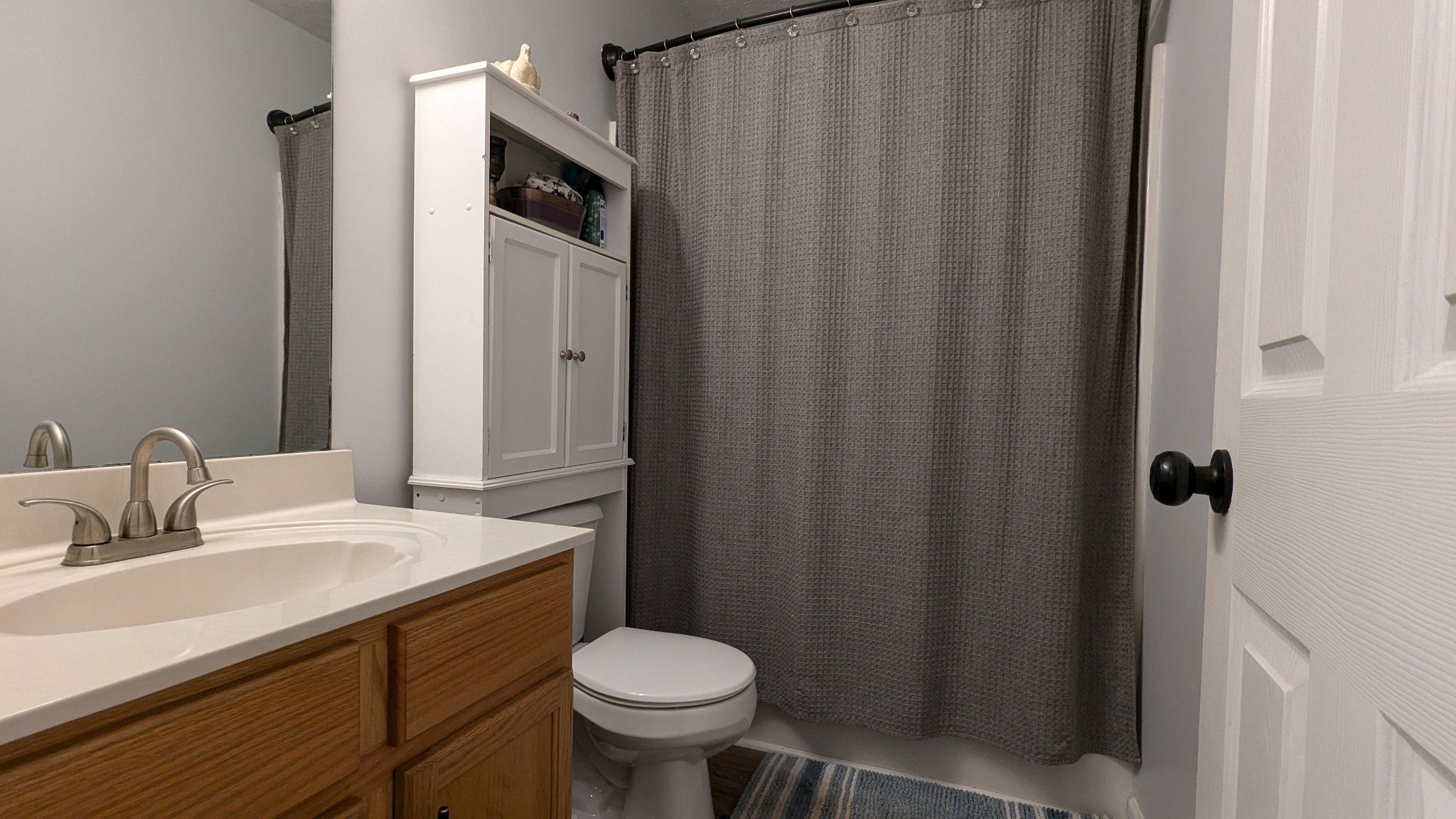 1099 North Boiling Springs Road Portland, TN 37148 - Photo 24 of 39 a bathroom with a sink and a toilet