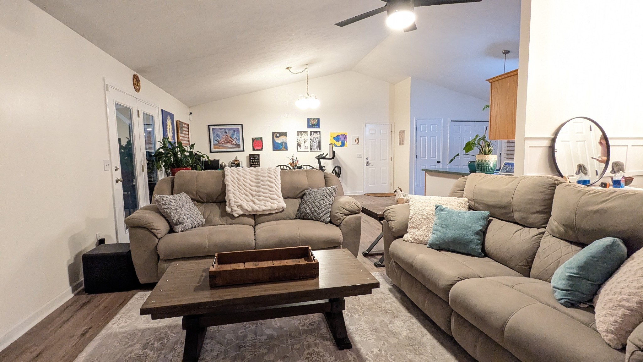 1099 North Boiling Springs Road Portland, TN 37148 - Photo 9 of 39 a living room with furniture a rug and a potted plant
