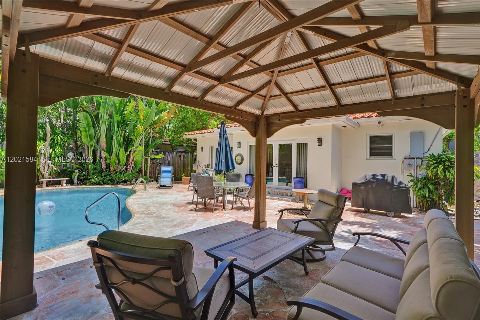 811 Northeast 73rd Street Miami, FL 33138 - Photo 23 of 51 a outdoor space with patio lots of furniture