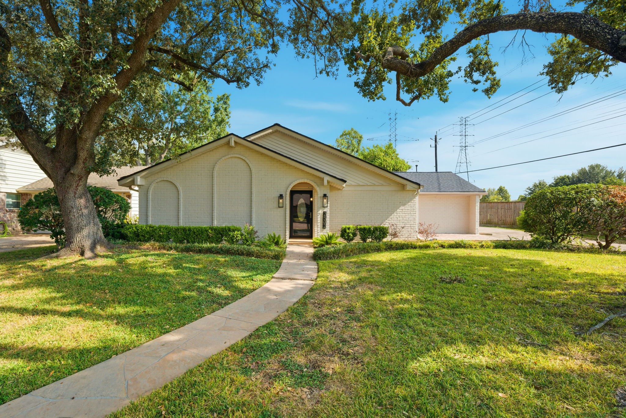 2502 Hollow Hook Road Houston, TX 77080 - Photo 1 of 35 a front view of house with yard and green space