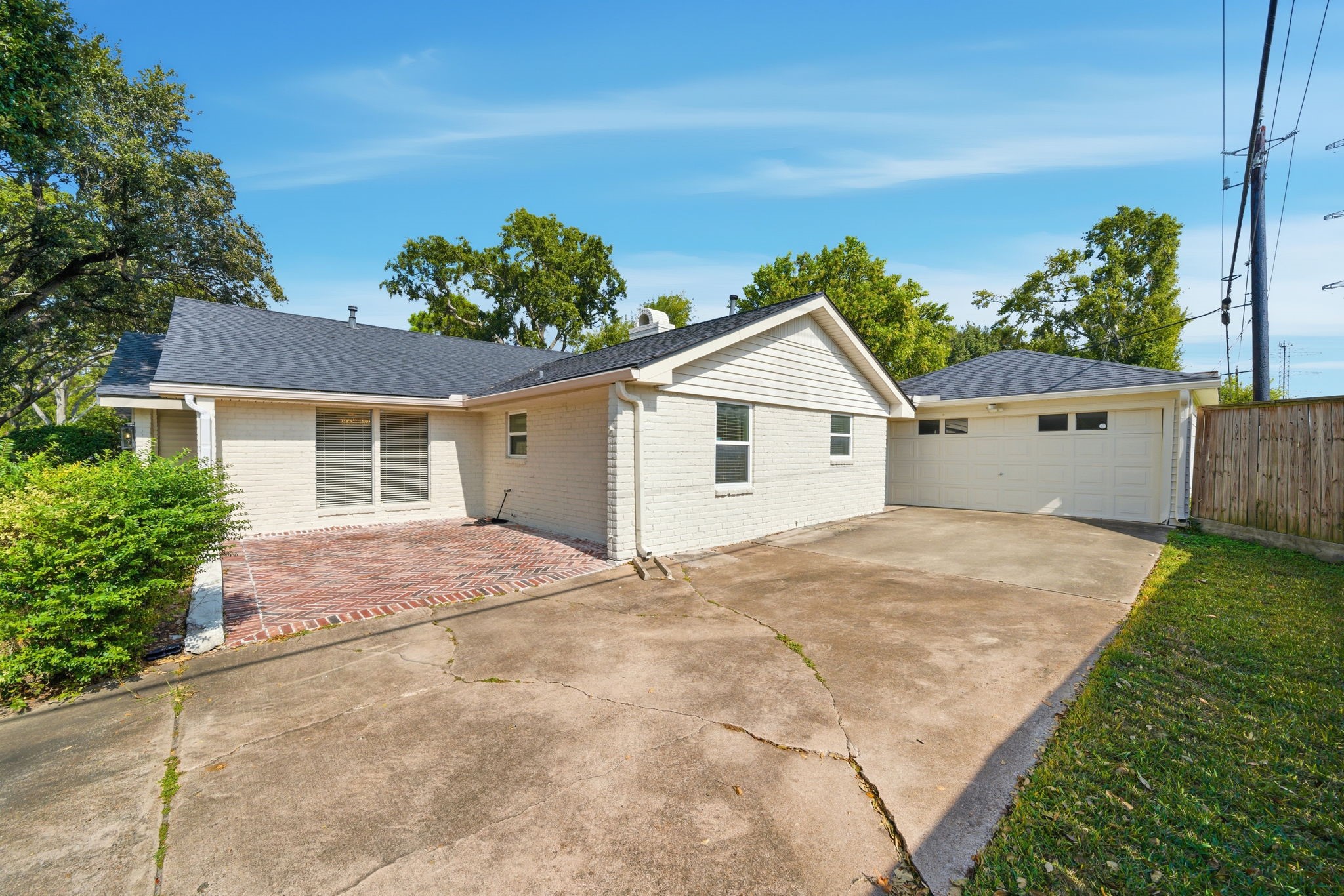 2502 Hollow Hook Road Houston, TX 77080 - Photo 2 of 35 a view of a house with a yard and potted plants