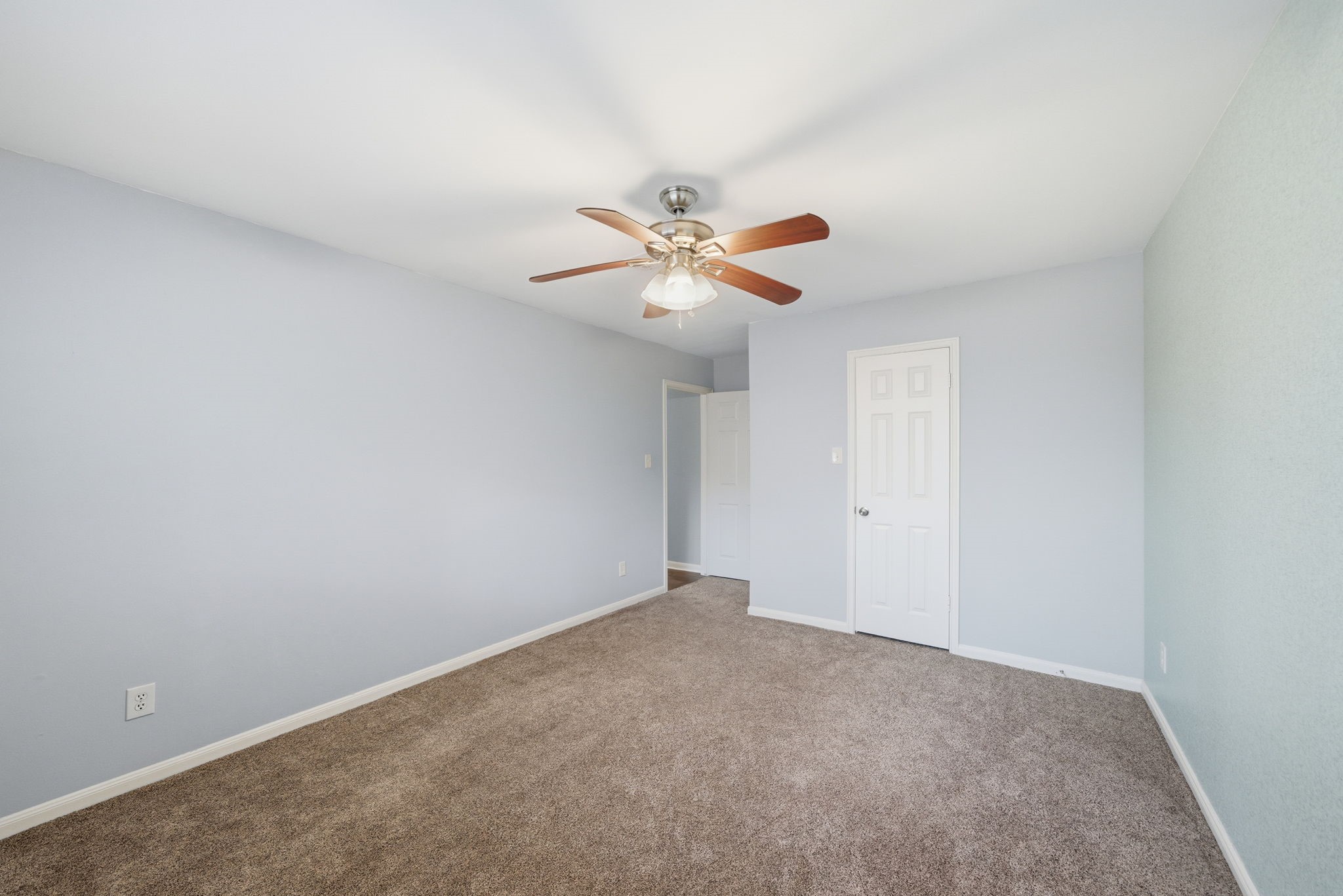 2502 Hollow Hook Road Houston, TX 77080 - Photo 25 of 35 a view of an empty room with a fan