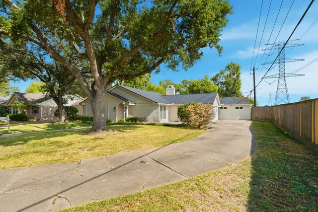a house with trees in front of it