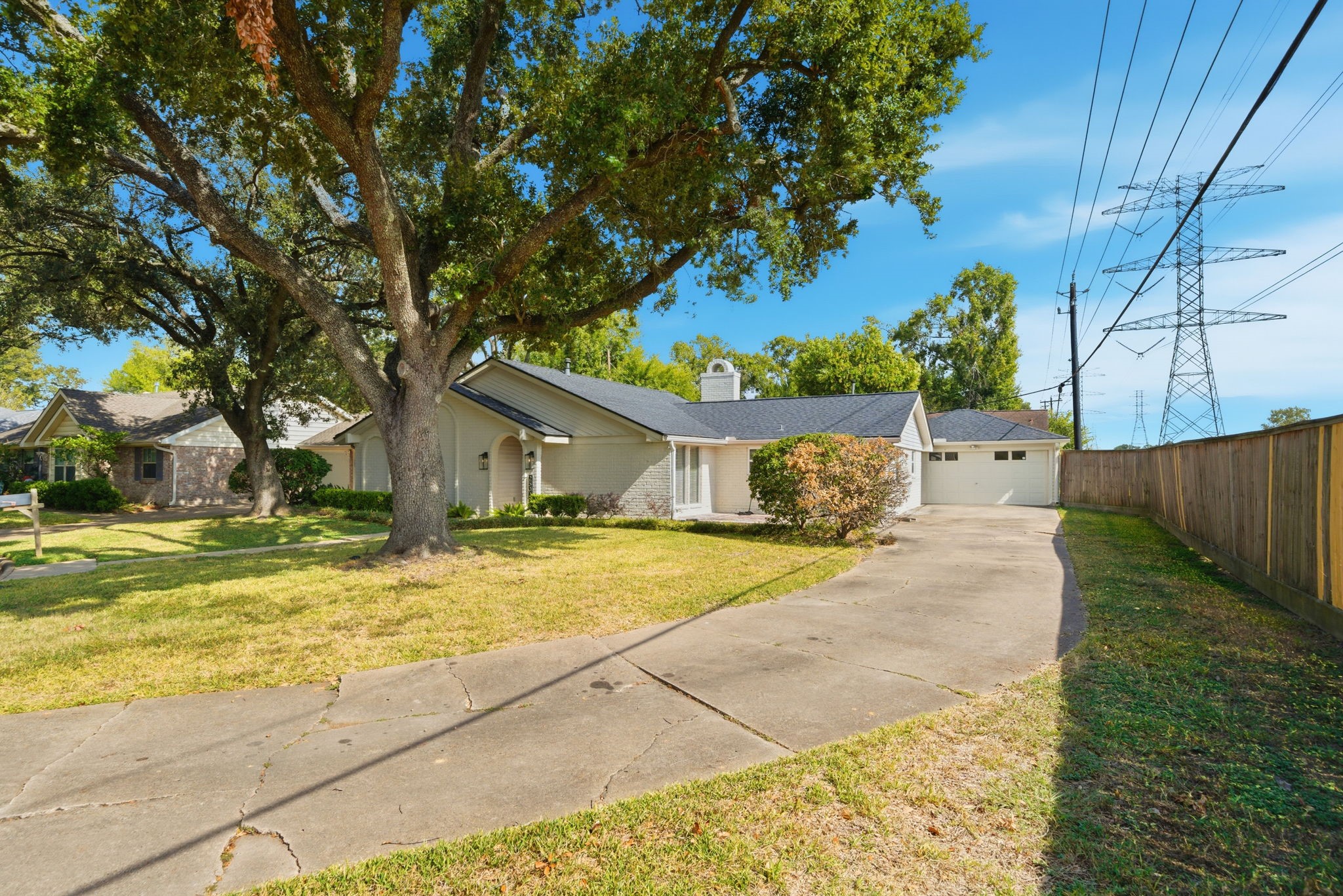 2502 Hollow Hook Road Houston, TX 77080 - Photo 4 of 35 a house with trees in front of it