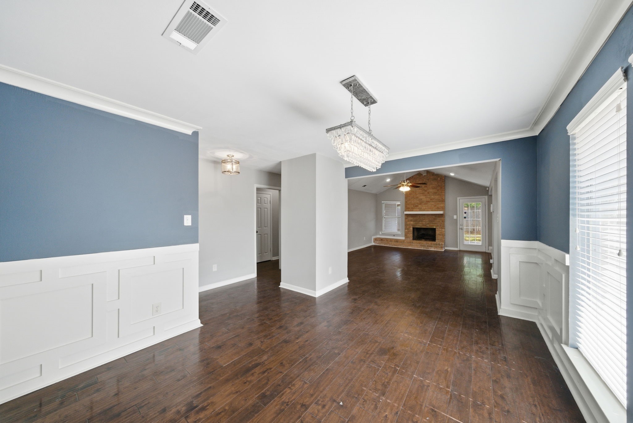 2502 Hollow Hook Road Houston, TX 77080 - Photo 5 of 35 a view of livingroom with hardwood floor and a ceiling fan