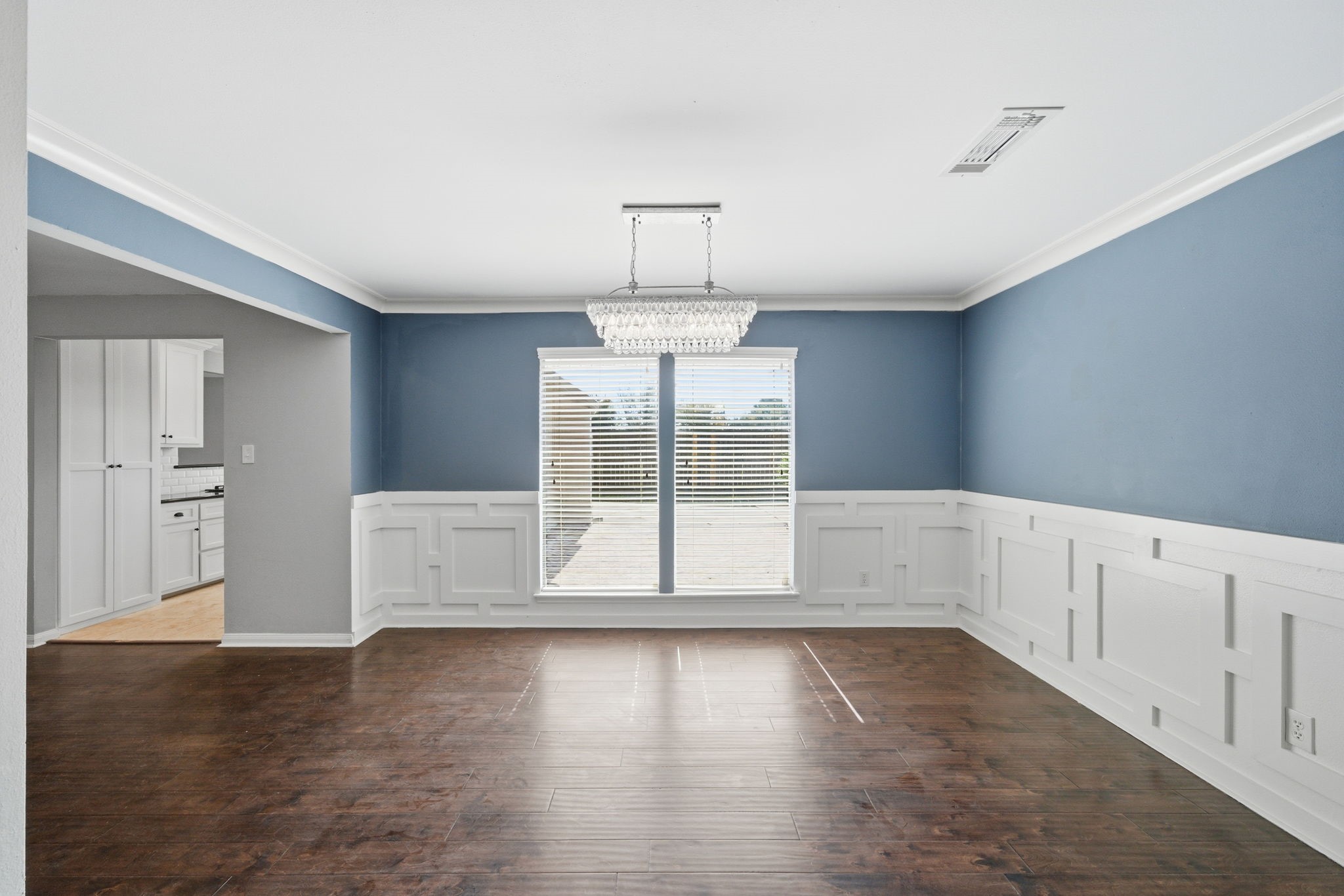 2502 Hollow Hook Road Houston, TX 77080 - Photo 6 of 35 a view of empty room with wooden floor and window