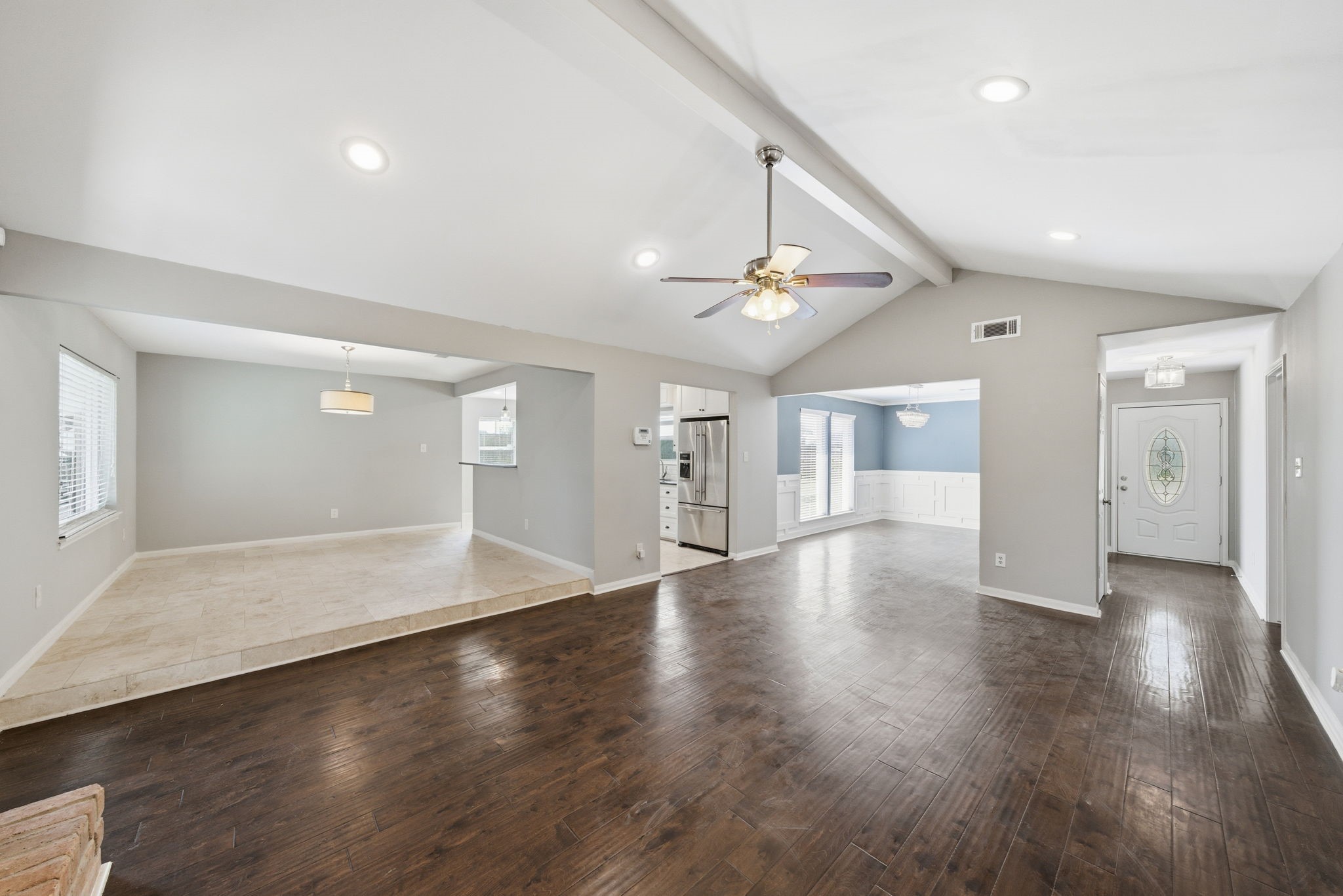 2502 Hollow Hook Road Houston, TX 77080 - Photo 10 of 35 a view of an empty room with wooden floor and a window