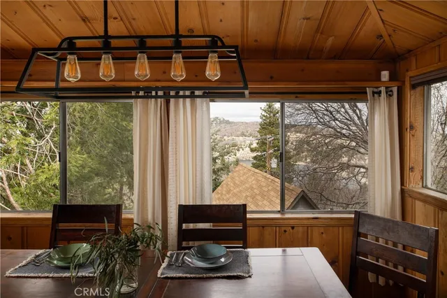 a living room with large windows