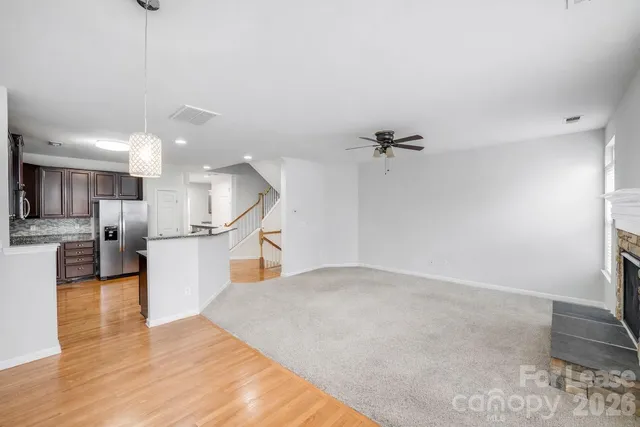 a view of a kitchen with a sink