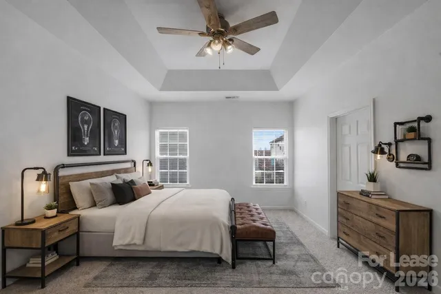 a bedroom with bed and window