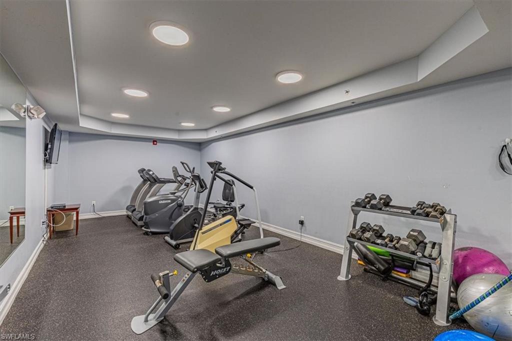 1100 Pine Ridge Road Naples, FL 34108 - Photo 18 of 21 a view of a room with gym equipment