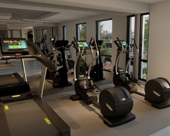 99 Sumner Street, Unit 306 Boston, MA 02128 - Photo 8 of 11 a room with gym equipment and windows