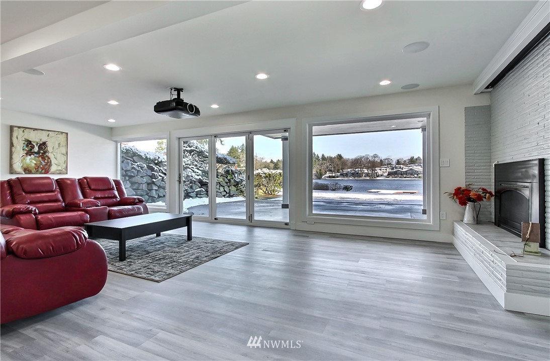 8925 Lake Steilacoom Point Road Southwest Lakewood, WA 98498 - Photo 24 of 31 a living room with furniture and a flat screen tv