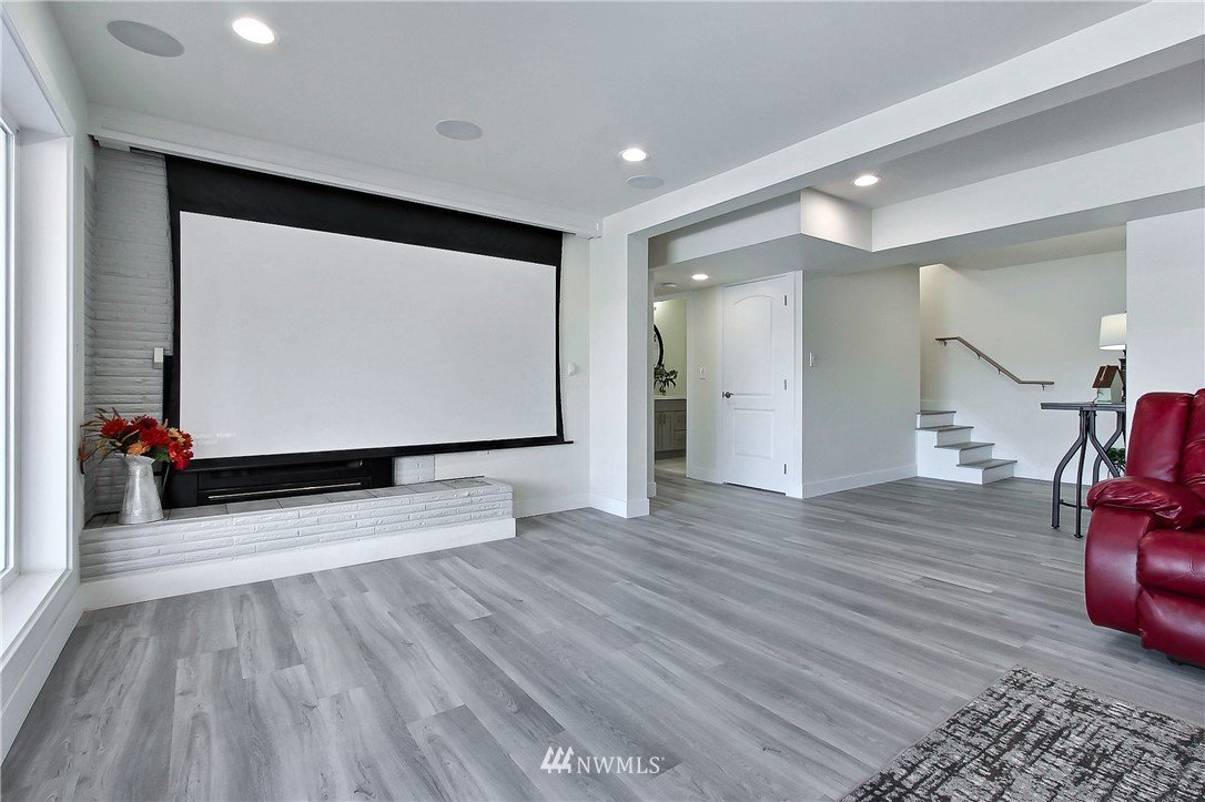 8925 Lake Steilacoom Point Road Southwest Lakewood, WA 98498 - Photo 25 of 31 a view of room with wooden floor