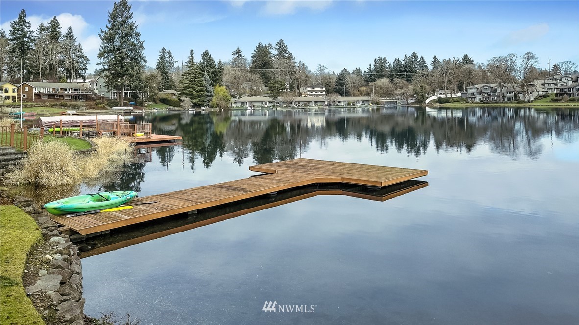 8925 Lake Steilacoom Point Road Southwest Lakewood, WA 98498 - Photo 5 of 31 a view of a lake with houses in the background