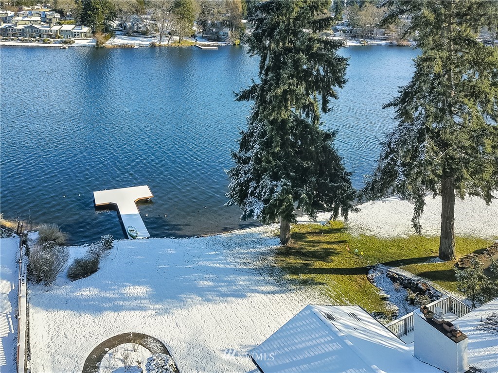 8925 Lake Steilacoom Point Road Southwest Lakewood, WA 98498 - Photo 6 of 31 a view of a lake with a house