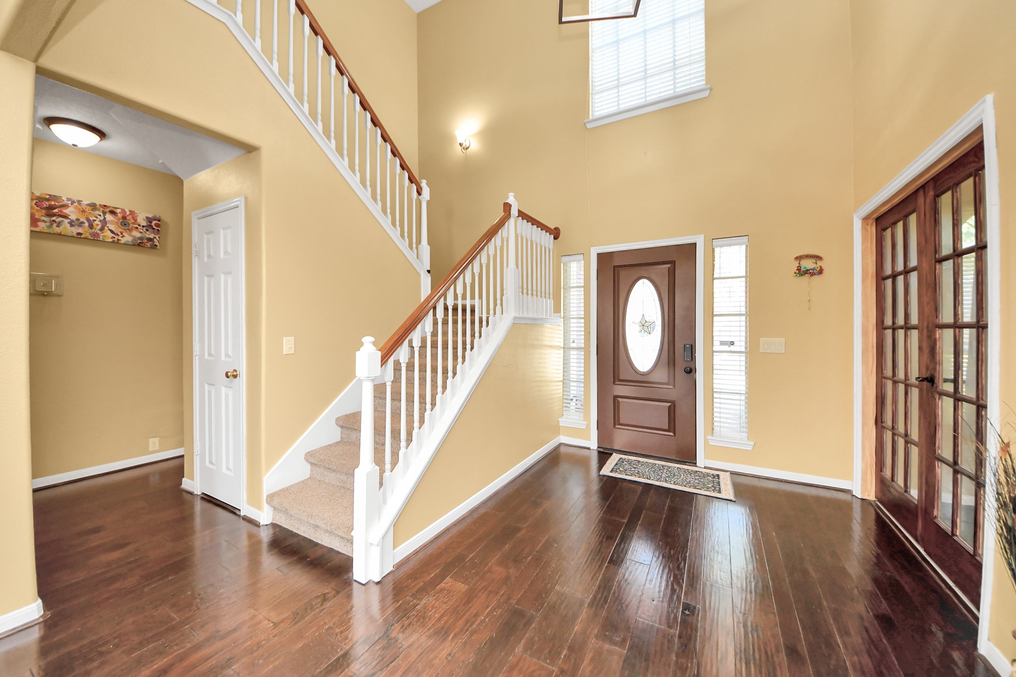 13635 Treebank Lane Houston, TX 77070 - Photo 18 of 37 a view of an entryway with wooden floor