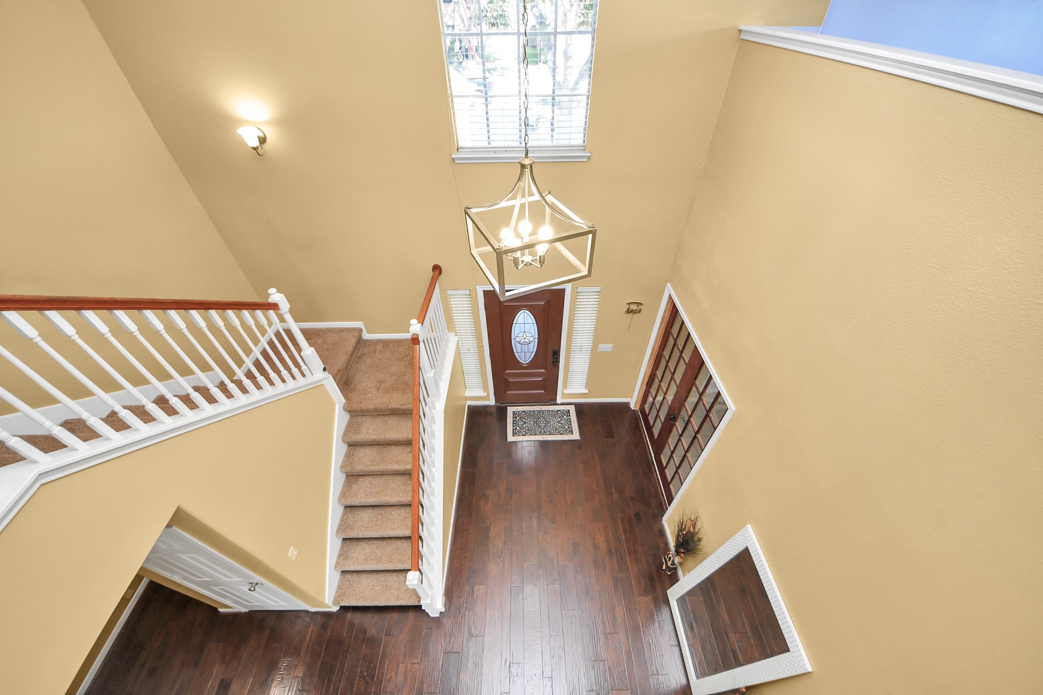 13635 Treebank Lane Houston, TX 77070 - Photo 28 of 37 a view of a staircase and wooden floor